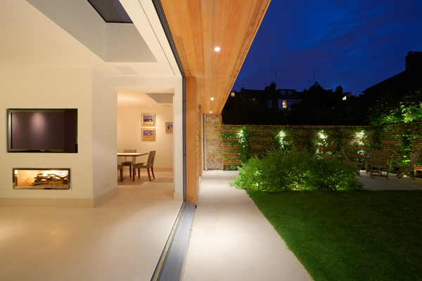 light outside the glass doors extending the space