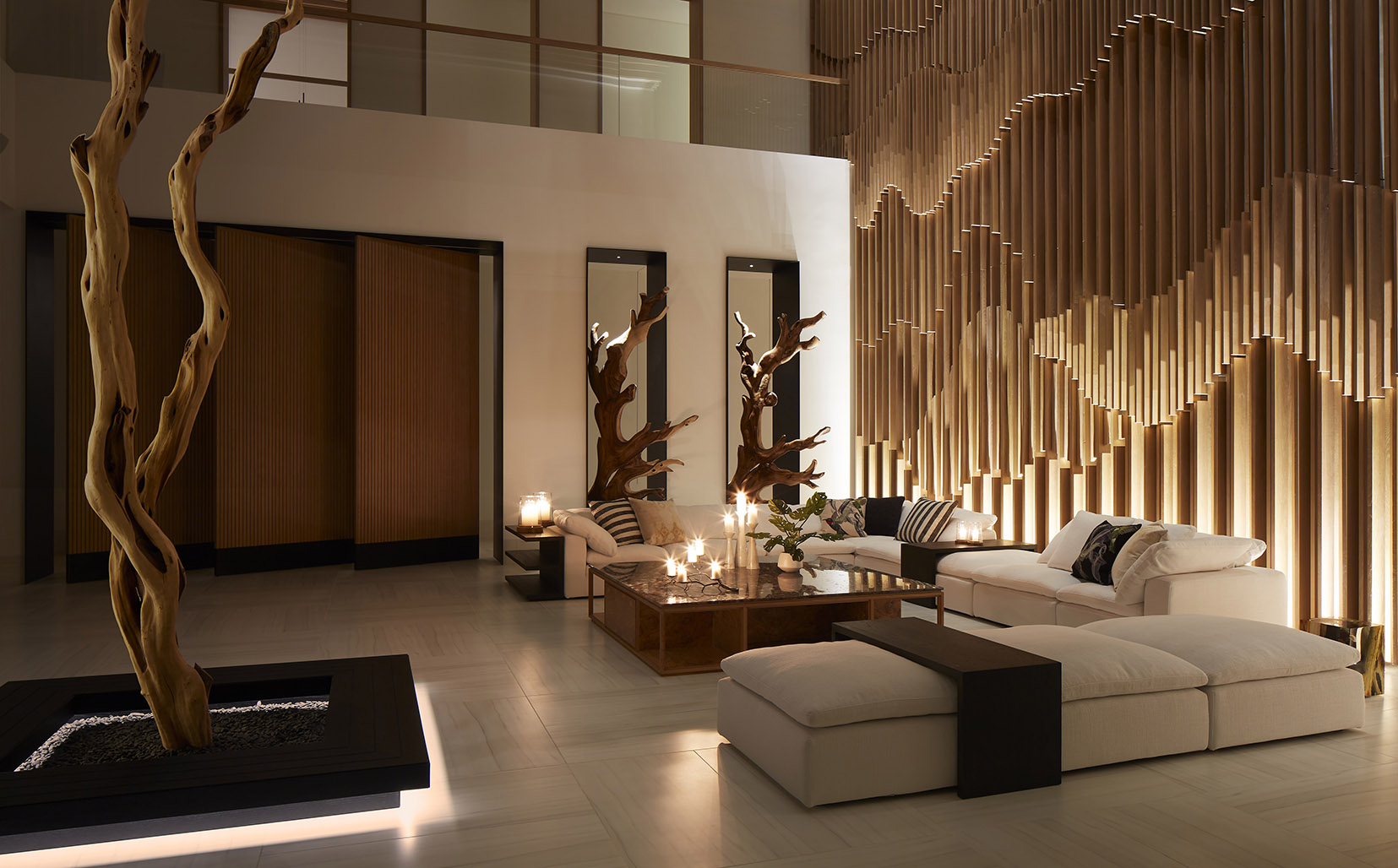 double height living room with timber wall with uplights and floating planters