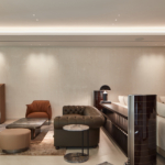 Living room area with coffer lighting and light to art