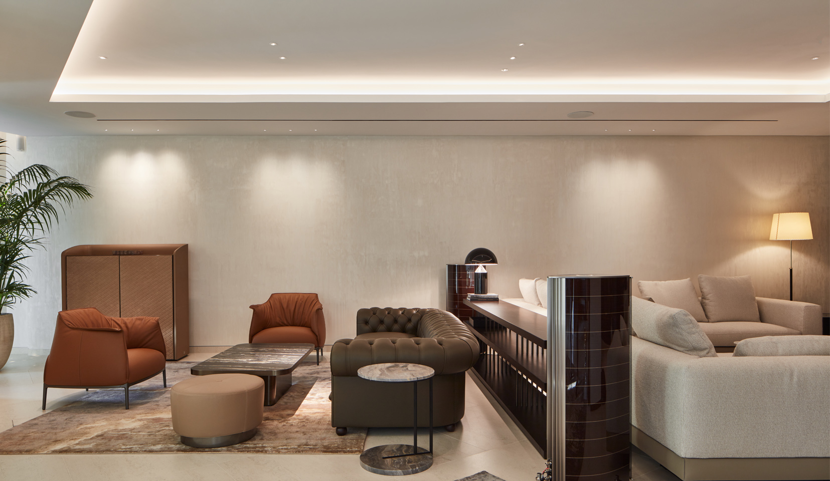Living room area with coffer lighting and light to art