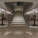 Luxury lighting scheme in dramatic hallway and sweeping staircase