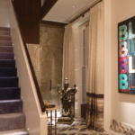Lighting for Hall with funky art and staircase