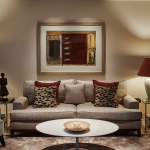 cosy living area with artwork and table lamps