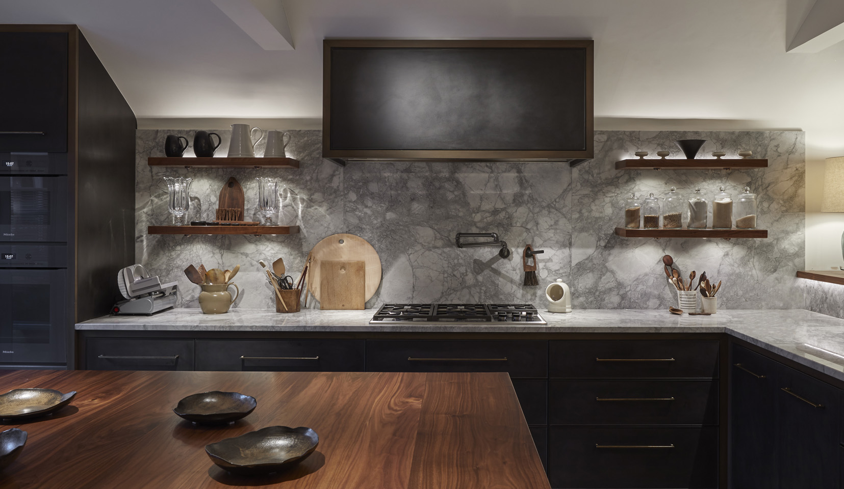marble kitchen with pitched ceiling