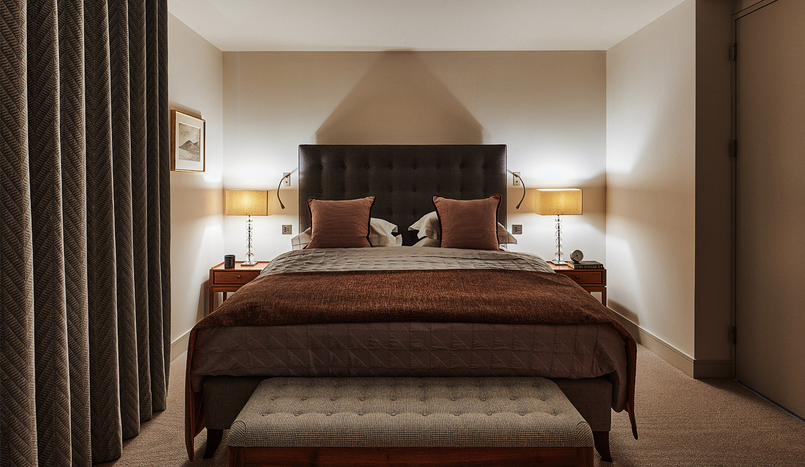 Bedroom with table lamps wither side of bed