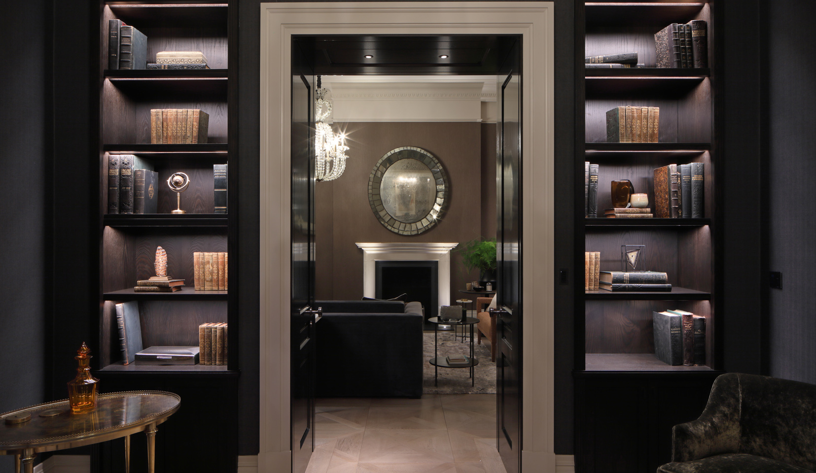 shelving lit with linear strip to backlight objects either side of doorway