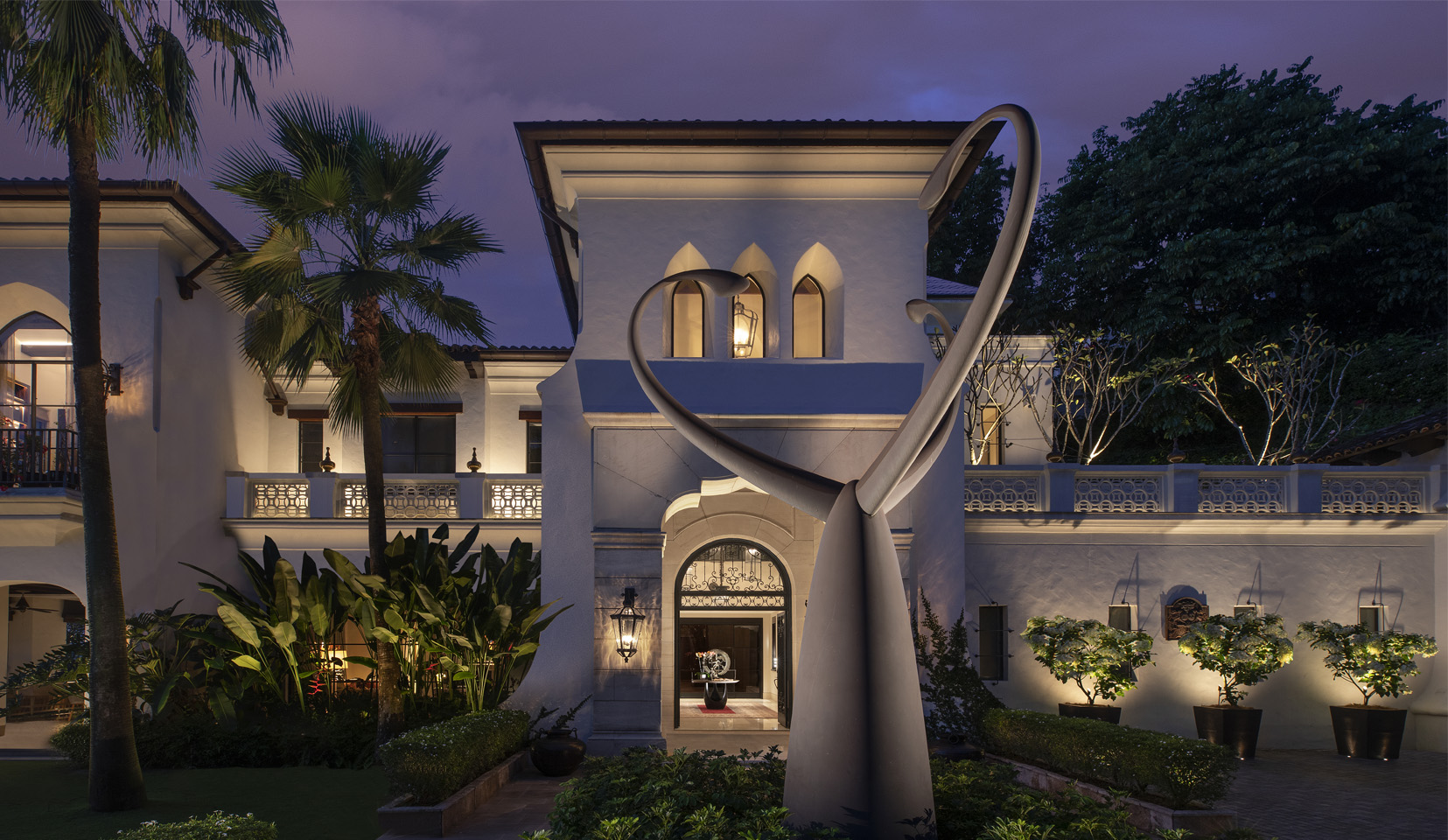 Facade of Kuala Lumpur villa with dramatic uplighting