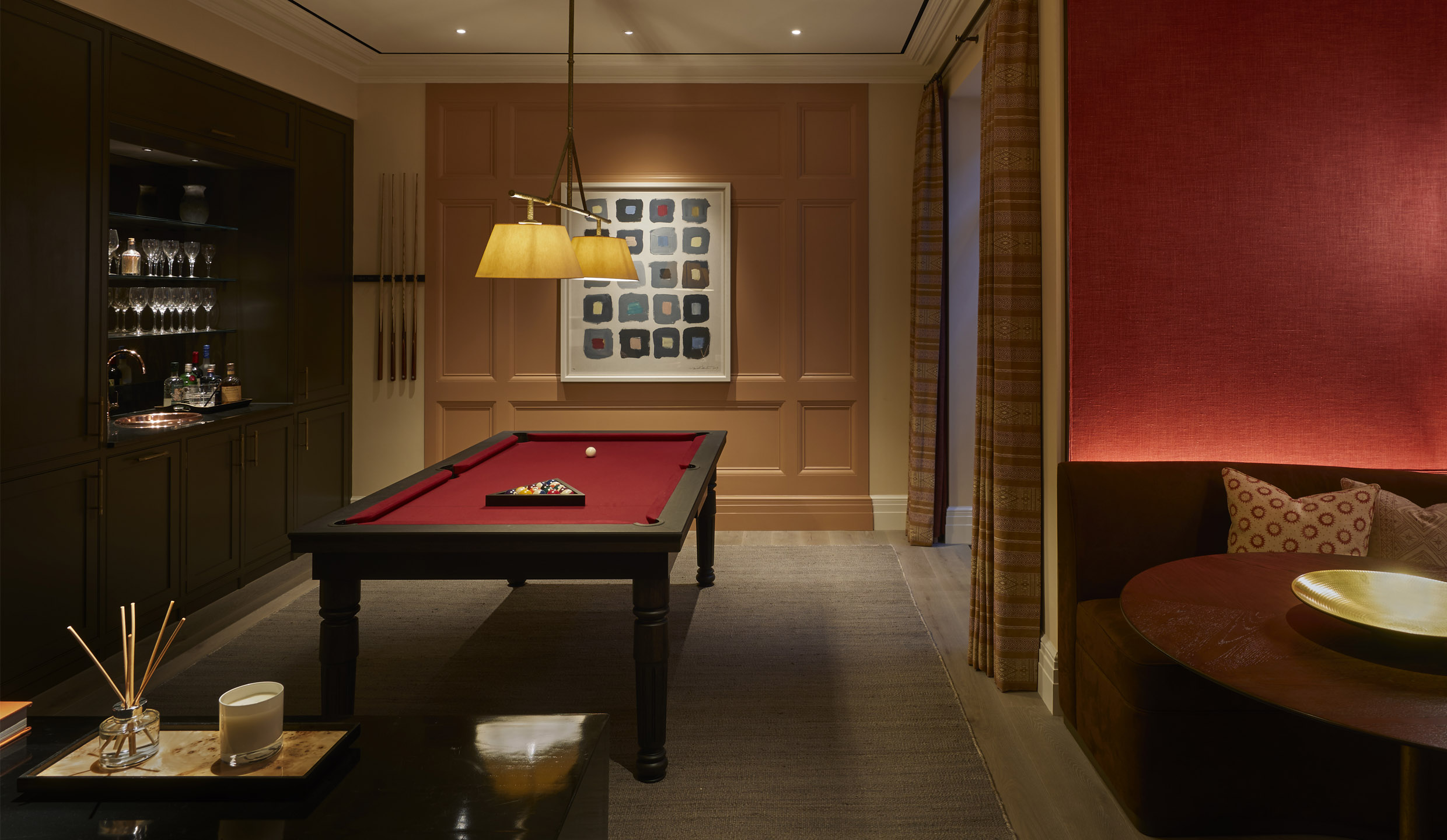 bar area and pool table in entertainment room