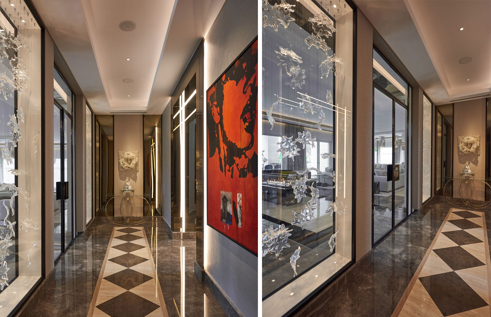 hallway lit with uplights in wall divider and lit artwork