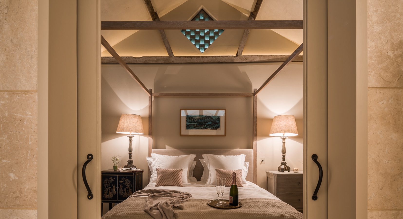 bedroom with uplit pitched ceiling