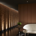 uplit wall crating a dramatic corridor