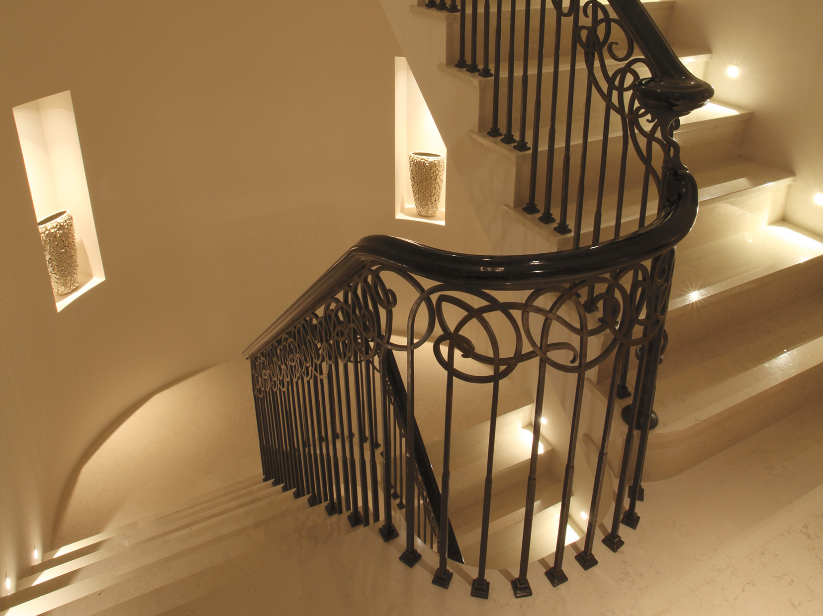 downlit niches on staircase