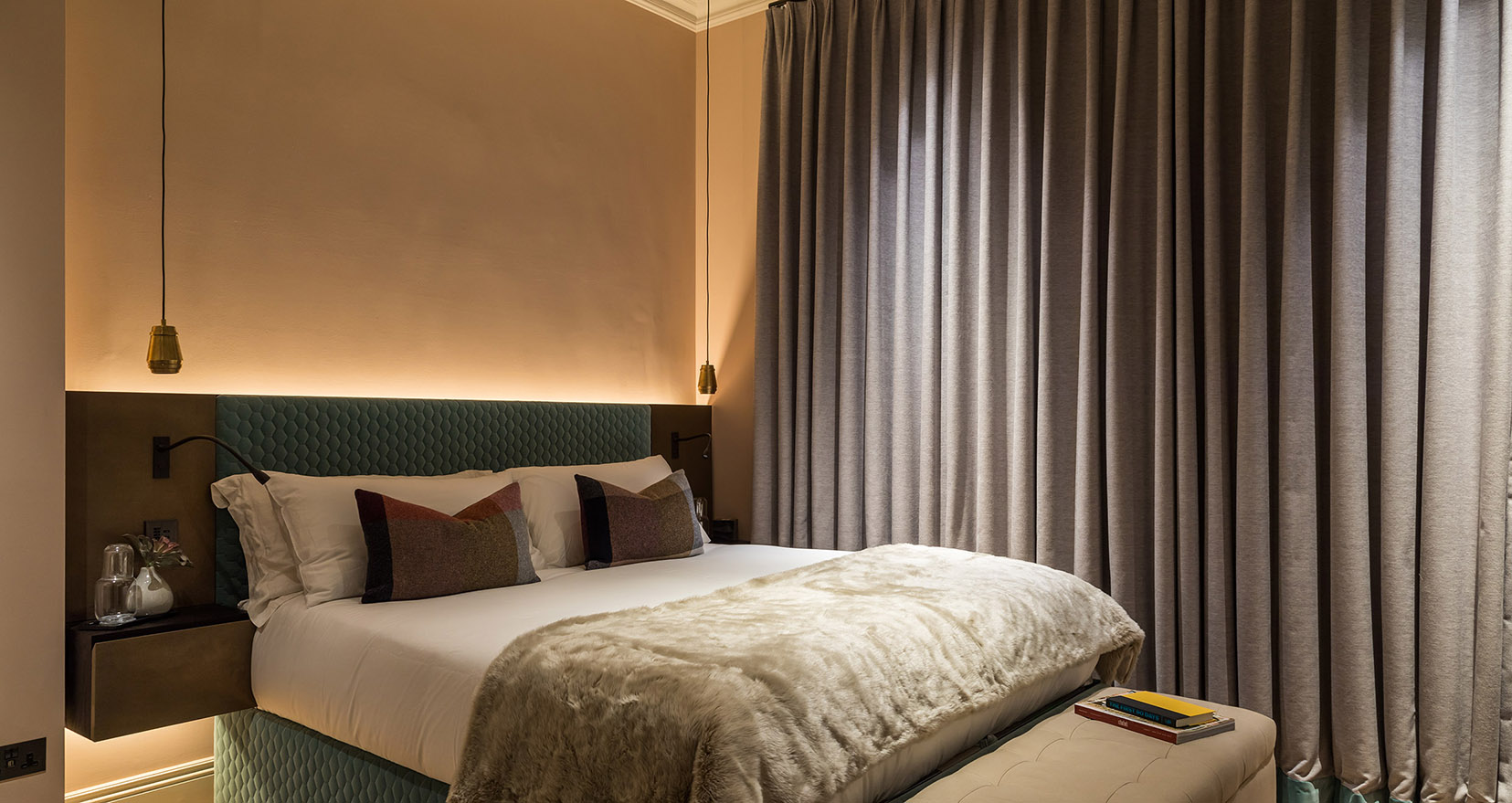 uplight from headboard and beneath built-in bedside table