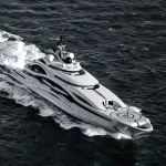 superyacht driving through waves