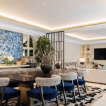 Malikiya beach front luxury resort hotel living and dining room with LED strip concealed in coffer and shelving