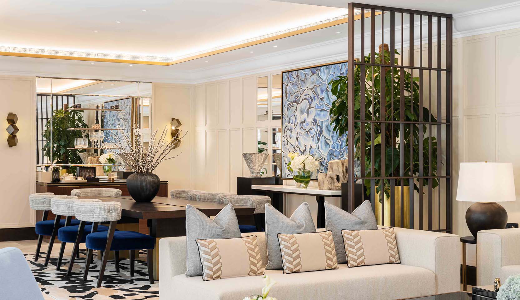 Dining area lighting within coffered ceiling with luxury interiors of this resort hotel
