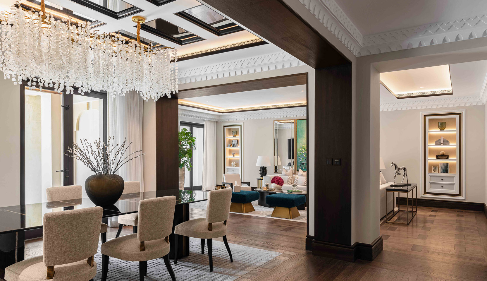 dining area wit pendant lighting and coffer lighting