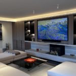 Modern living room with sleek lit joinery unit
