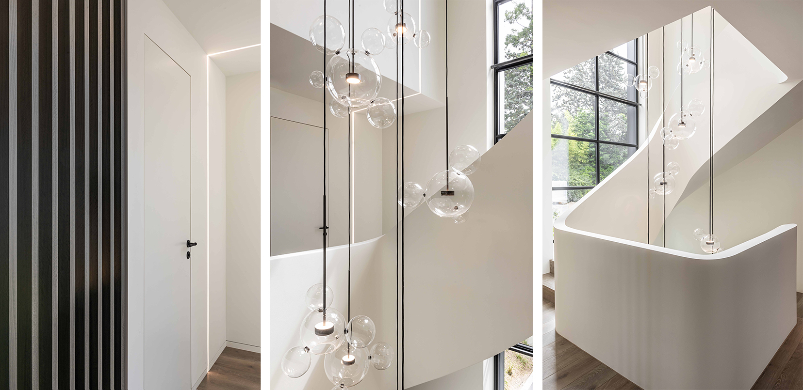 central staircase with pendant running through all levels with strips of light down the walls